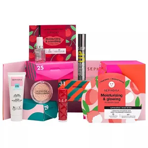 Sephora advent calendar with various skincare and makeup items, including moisturizing and glowing creams, a blush, mascara, and serums in vibrant, colorful packaging.