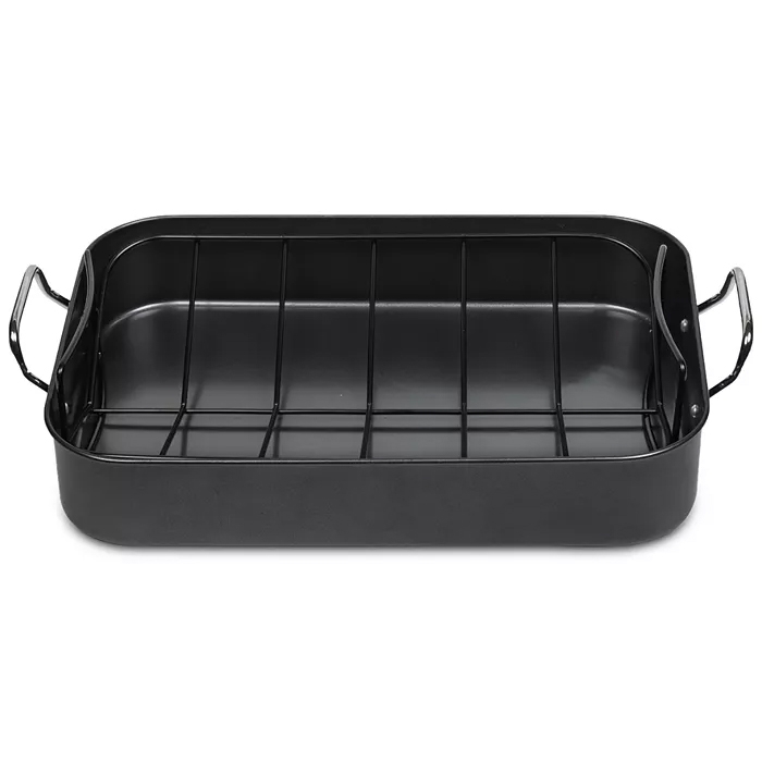 A black nonstick rectangular roasting pan with a removable rack and two handles on the sides for easy lifting.