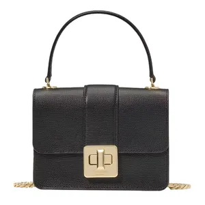 A black leather handbag with a top handle and gold hardware, featuring a turn-lock closure.
