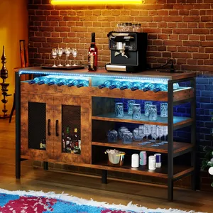 A rustic bar cabinet with metal mesh doors and open shelves, featuring wine bottle storage, glass racks, various liquors, a coffee machine, and ambient LED lighting.