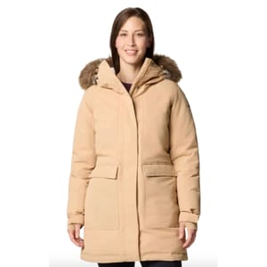 A beige Columbia Insulated Parka with a front zipper, large flap pockets, and a hood featuring faux fur trim. Suitable for cold weather, it offers warmth and protection.