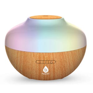 A round essential oil diffuser with a wood-textured base and a smooth, pastel-colored top, featuring buttons for light and power controls.