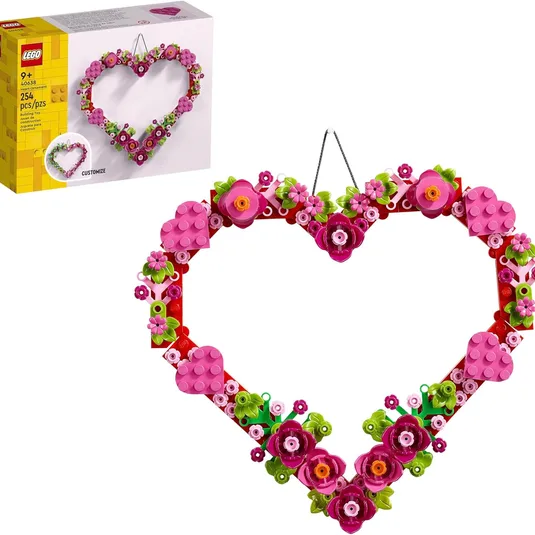 Heart-shaped LEGO set with floral decorations, featuring 254 pieces and suitable for ages 9+. Comes with a customizable assembly for creative building and display.