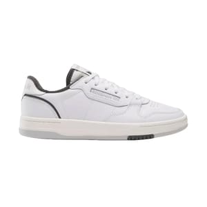 A white Reebok sneaker with black accents, featuring a low-top design, lace-up closure, and a textured sole.