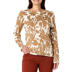Liz Claiborne Floral Pullover Sweater features a cream base with a bold, brown botanical print. It has long sleeves and a comfortable fit, paired here with burnt orange pants.