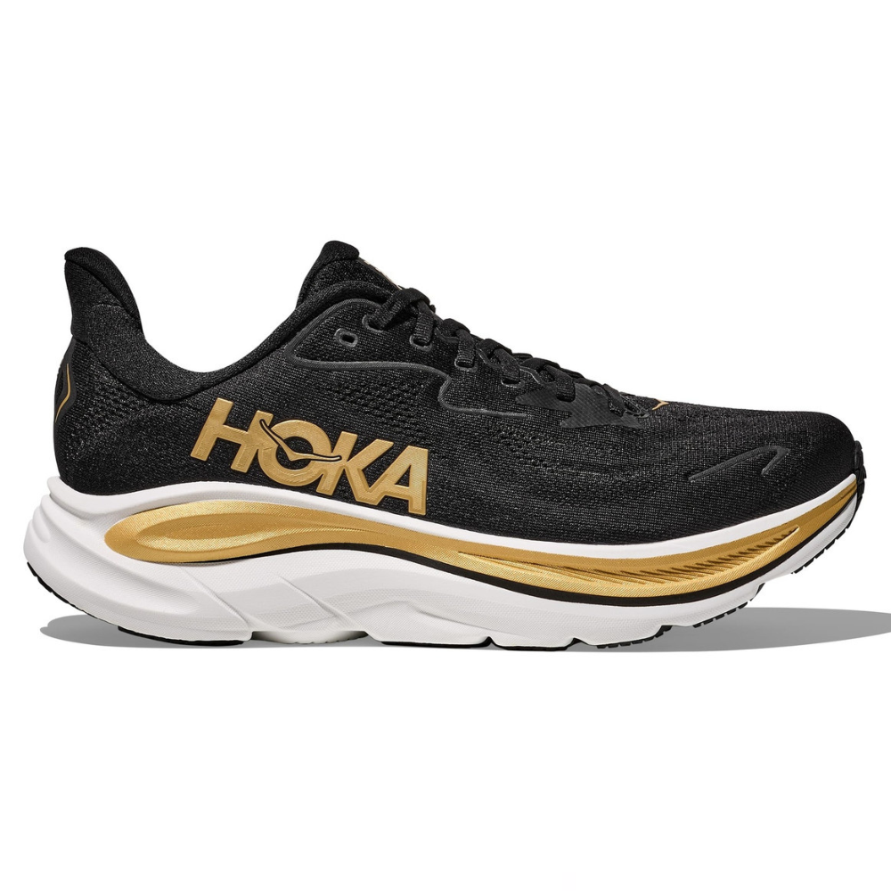 Black and gold Hoka running shoe with a thick white sole, featuring a prominent Hoka logo on the side.