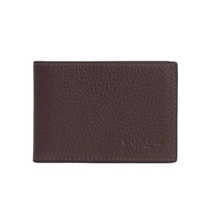A brown leather Coach Compact Billfold Wallet with a textured finish, featuring the Coach New York logo embossed in the corner.