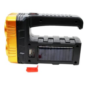 A handheld flashlight with a dual lens, featuring a solar panel on the side and a USB charging port.