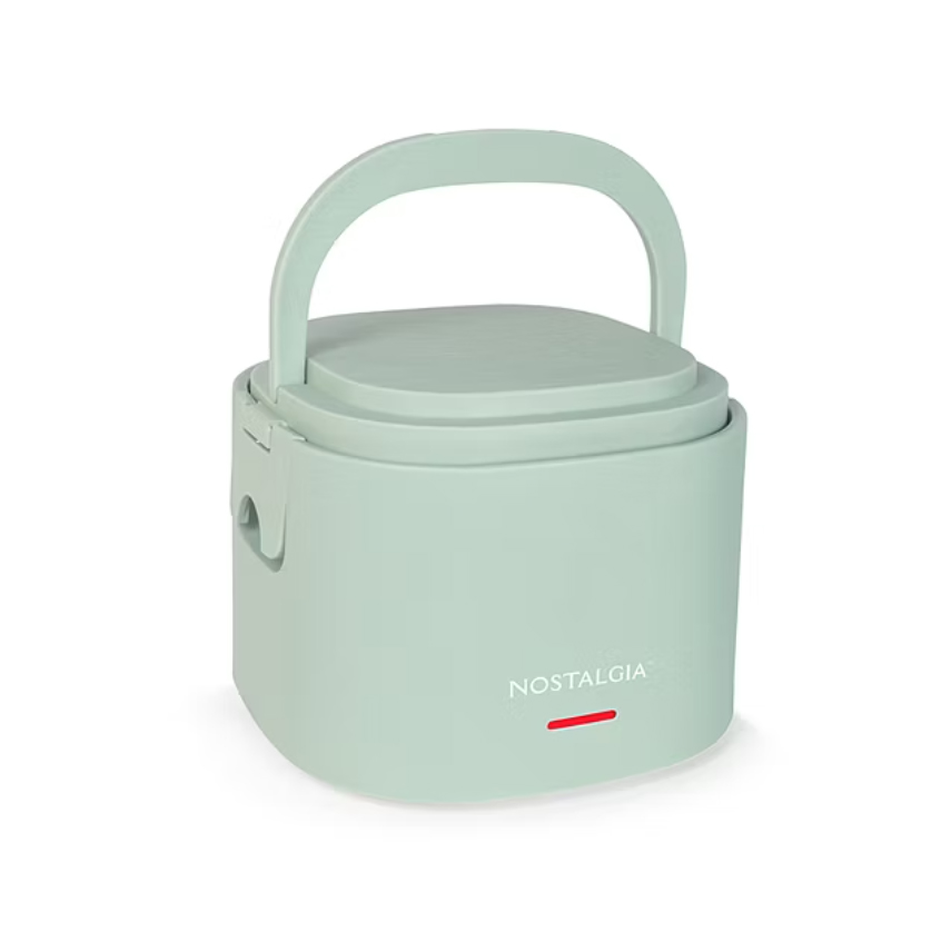 A mint green heated lunch box with a handle, featuring the brand name \“Nostalgia.\“ It has a secure latch and a red indicator on the front.