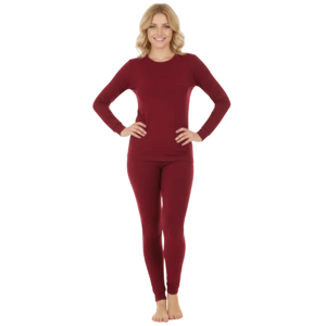 Woman wearing a maroon long-sleeve top and matching leggings, likely intended as thermal or casual wear.
