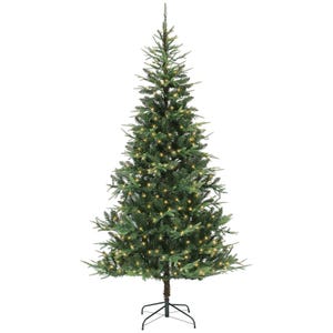 Philips 7.5' Lit Christmas Fraser Fir Tree features realistic green branches with warm, integrated lights, standing on a sturdy metal base.