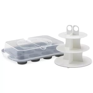 A cupcake carrier with a clear lid and a three-tiered cupcake stand, both in white.