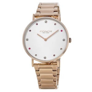 Coach Women's Perry Watch features a sleek gold-tone bracelet and a minimalist white dial adorned with crystal hour markers, offering a stylish and elegant design.