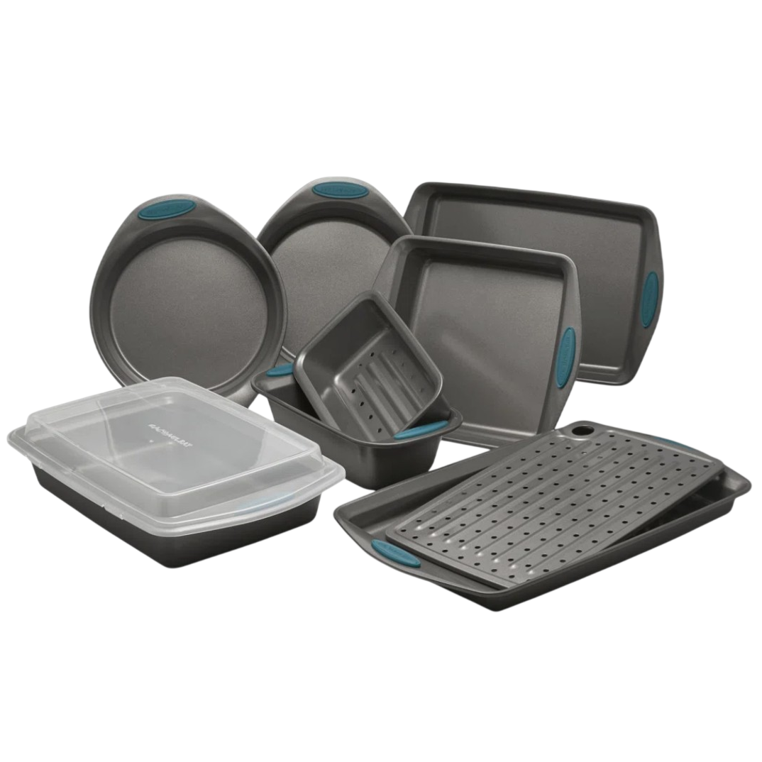 A set of non-stick bakeware includes round and square cake pans, a loaf pan, a covered rectangular cake pan, and a perforated baking pan, each with teal silicone grips.