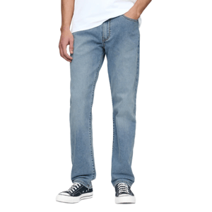 A person is wearing light blue jeans paired with black and white sneakers and a white shirt.