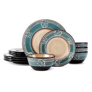 A dinnerware set with plates and bowls featuring a green and beige color scheme and decorative patterns, including starfish and floral designs.