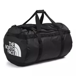 A black duffel bag from The North Face with durable straps and a zippered closure, featuring the brand's logo in white.