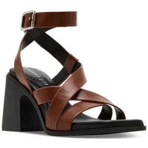 Madden Girl Strappy Block-Heel Sandals feature brown crisscross straps with an ankle buckle and a chunky black heel.