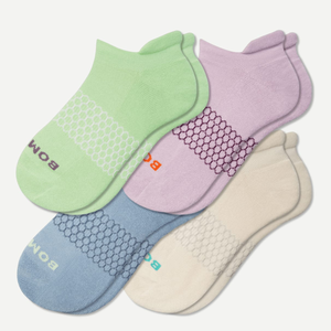 A set of four ankle socks in different pastel colors with textured patterns and branded logos.