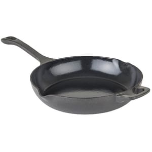 Cast iron skillet with a long handle and a small assist handle, featuring a glossy black interior.