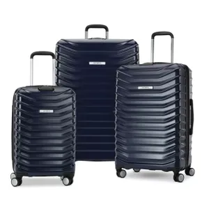 A set of three blue, hard-shell, rolling suitcases in different sizes.