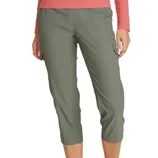 Woman wearing olive green capri cargo pants with a pink long-sleeve shirt. The pants feature side pockets and have a knee-length cut.