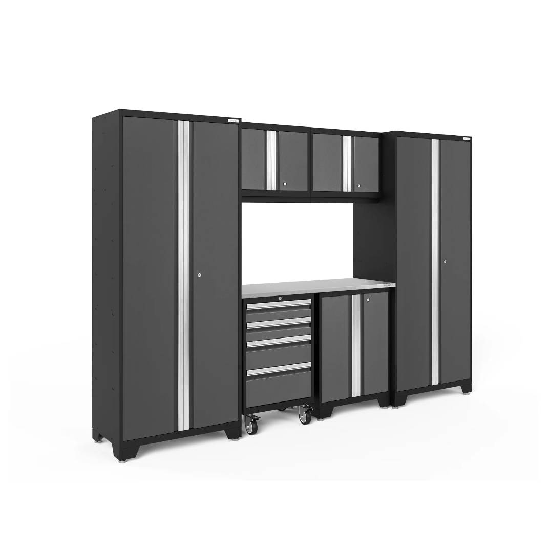 7-piece garage storage system featuring two tall cabinets, three overhead cabinets, a rolling tool cabinet with drawers, and a work surface, all in a black and silver color scheme.