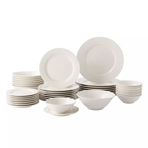 A 40-piece Food Network dinnerware set includes white plates, salad plates, bowls, and smaller dipping bowls in a matching plain design.