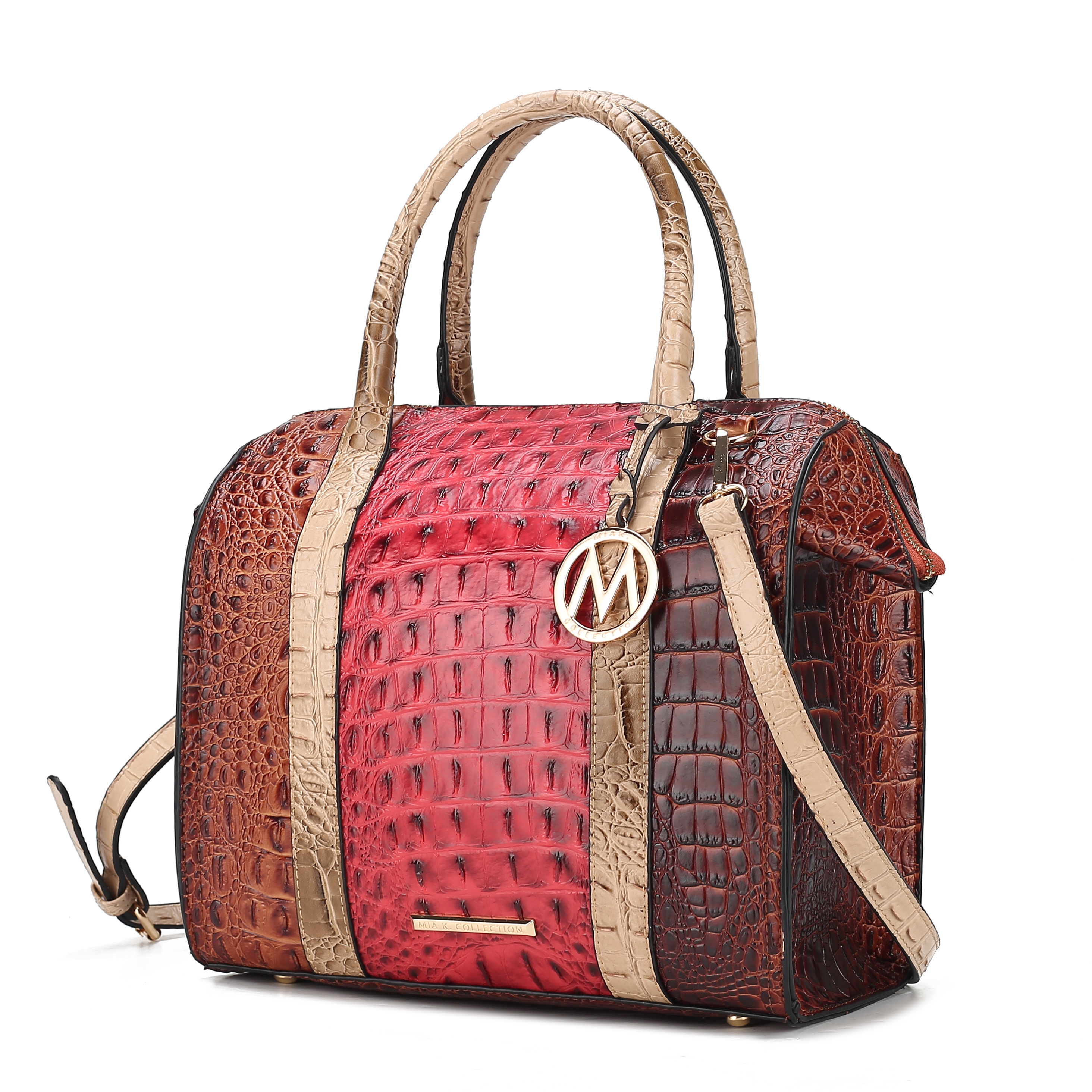 Crocodile-patterned handbag with a mix of red, brown, and beige colors featuring dual handles, a shoulder strap, and a circular gold-toned charm with an \“M\“ emblem.