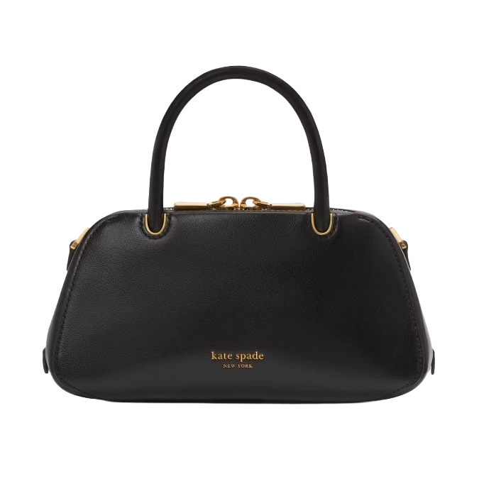 A black Kate Spade handbag with gold hardware and a structured silhouette, featuring two handles and the brand logo on the front.