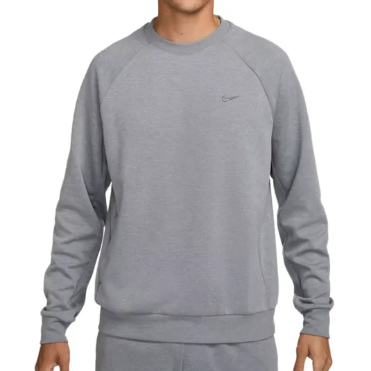 Gray sweatshirt with a small Nike logo on the chest, featuring long sleeves and a crew neck design.