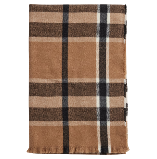 A rectangular scarf featuring a classic plaid pattern in tan, black, and white tones.