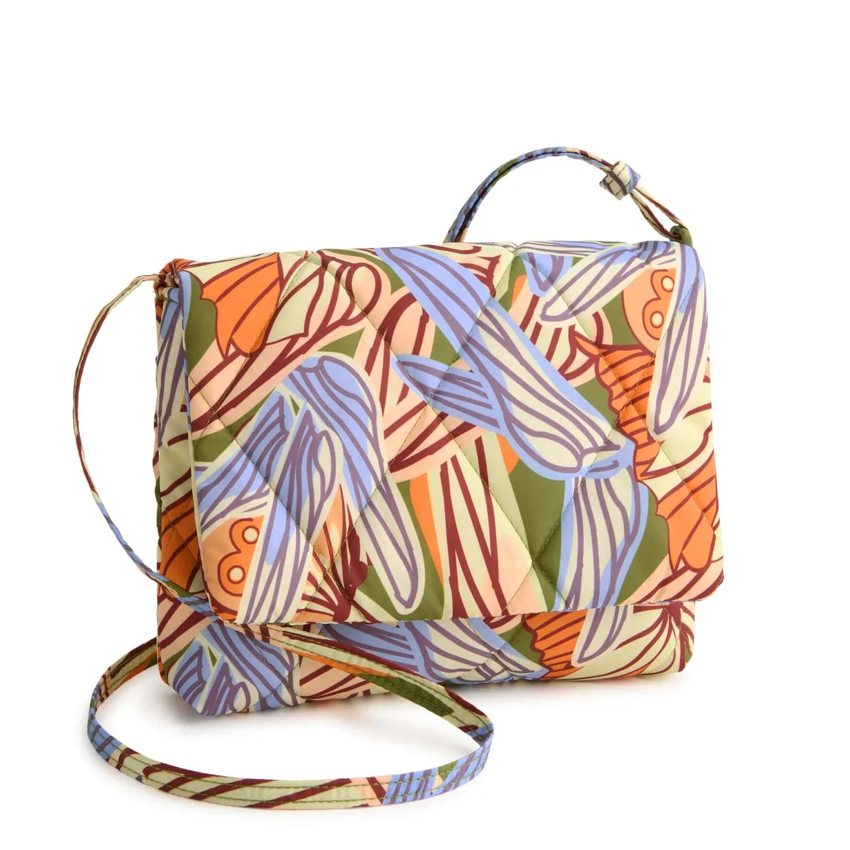 A shoulder bag featuring a colorful abstract floral pattern with a quilted texture, a top handle, and a long strap for crossbody use.