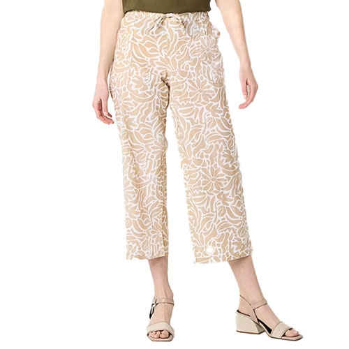 Beige capri pants with a white abstract floral pattern, wide-leg design, elastic drawstring waistband, and two front pockets, paired with beige open-toe block heel sandals.