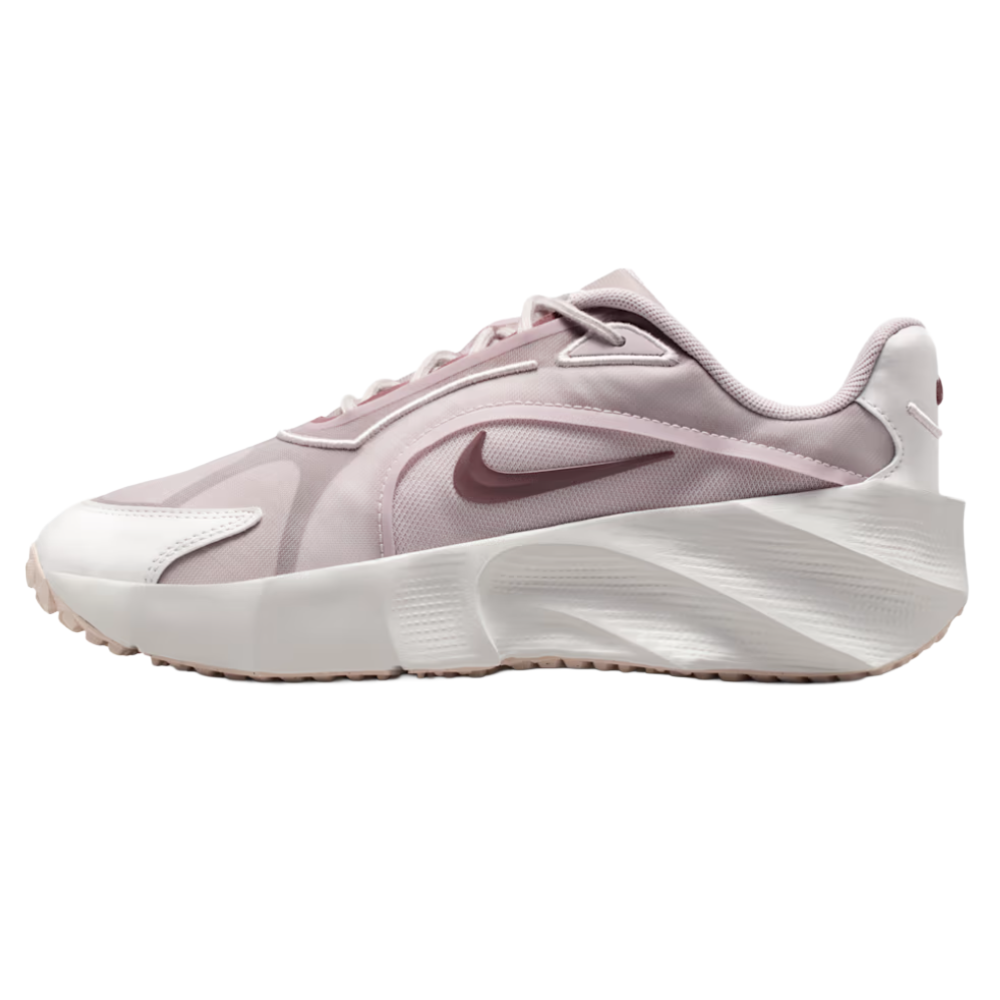 A light pink and white sneaker with a prominent Swoosh logo on the side and a textured, sculpted midsole.