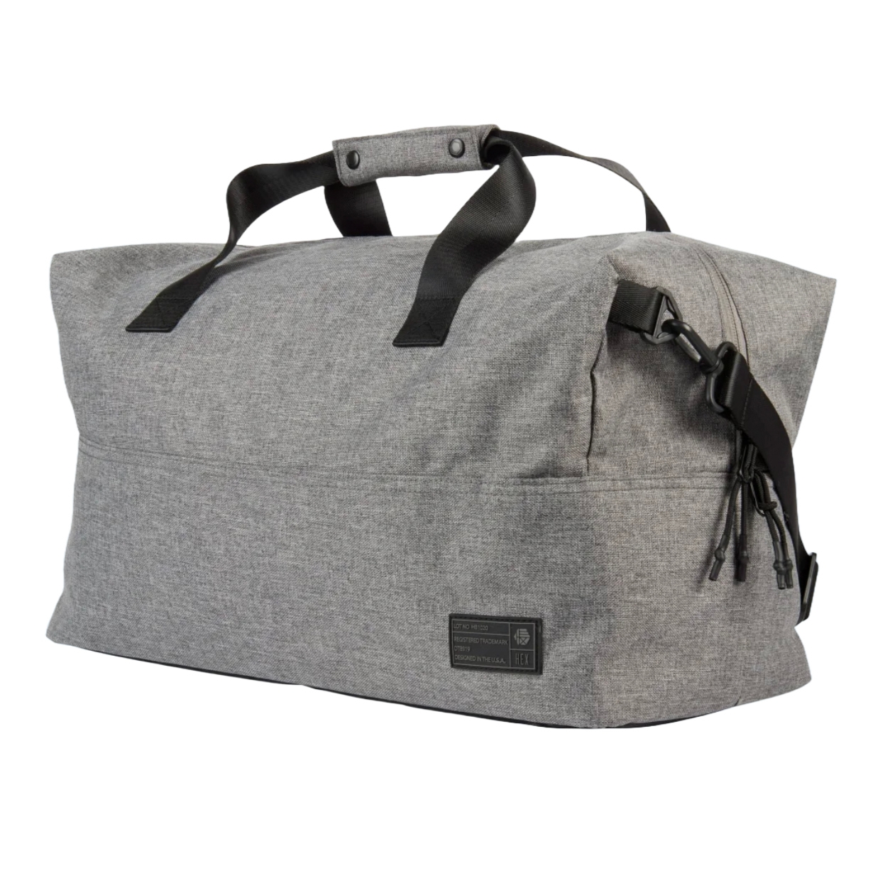 A large, gray duffel bag with black handles, designed for travel or everyday use, featuring a durable build and minimalistic look. It includes zip closures and an adjustable strap for versatile carrying options.
