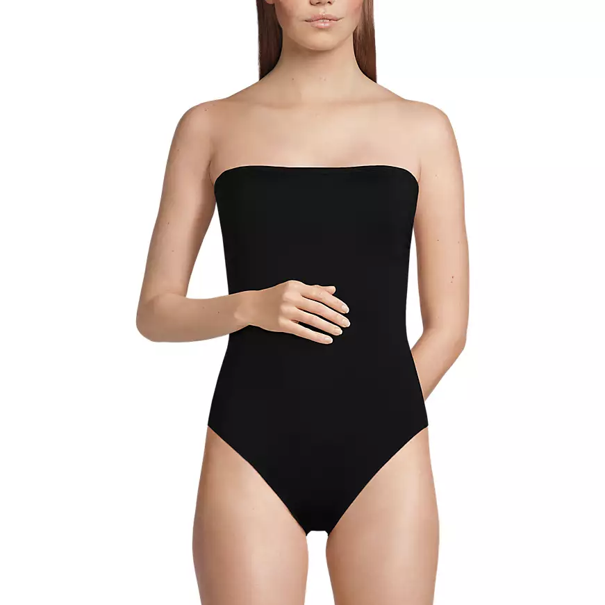 A strapless black one-piece swimsuit is shown, featuring a sleek and simple design.
