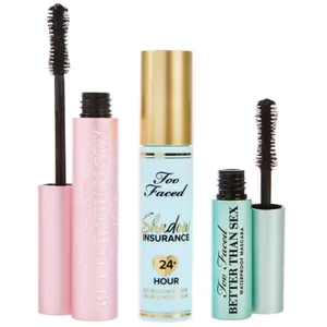 Too Faced cosmetics include Better Than Sex mascara in pink and turquoise tubes, and Shadow Insurance eye primer with 24-hour blue light defense in a blue and gold tube.
