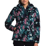 Multicolored fleece pullover with a half-zip front and a large front pocket, featuring a mix of teal, pink, and white patterns.