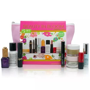 A variety of cosmetic items including makeup, skincare products, and a pink cosmetic bag.