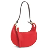 A red crescent-shaped handbag with a textured finish, featuring gold-tone hardware and a detachable strap in a contrasting dark color.