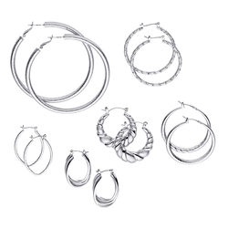 A collection of silver hoop earrings in various designs and sizes, including twisted and textured patterns.