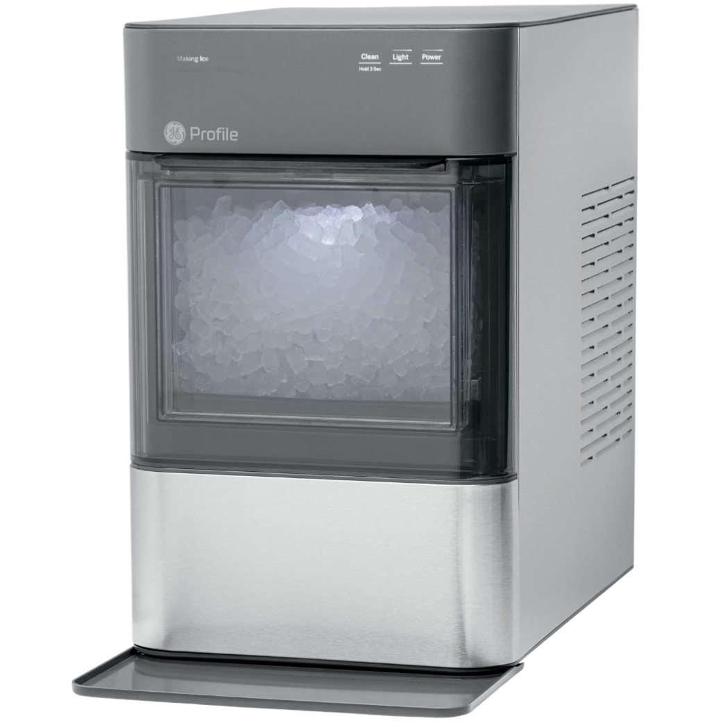 A GE Profile countertop ice maker with a transparent front, displaying a compartment full of nugget ice. It features controls for cleaning, lighting, and power on the top panel.