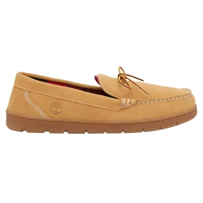 Tan suede moccasin with a rubber sole, featuring white stitching and a small tree logo on the side.
