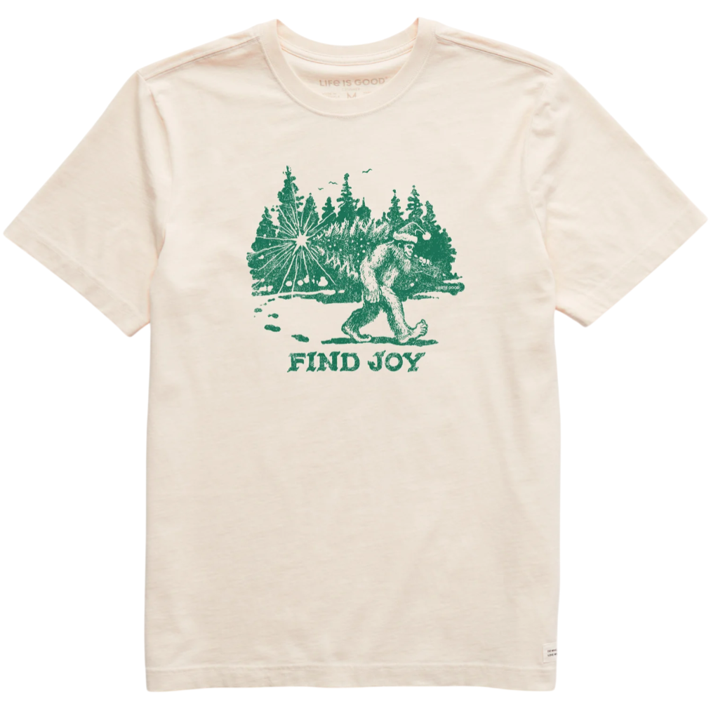 A beige T-shirt features a green graphic of Bigfoot walking in a forest with the text \“FIND JOY\“ below.