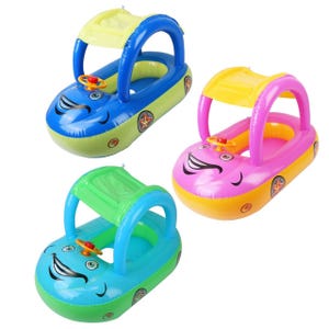 Three colorful baby inflatable car-shaped pool floats with smiling faces, steering wheels, and sun canopies are shown. They come in combinations of blue and green, pink and yellow, and light blue and green.