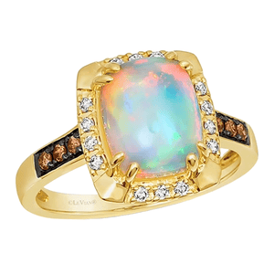A gold ring featuring a large opal centerpiece surrounded by small diamonds, with additional brown stones set into the band.