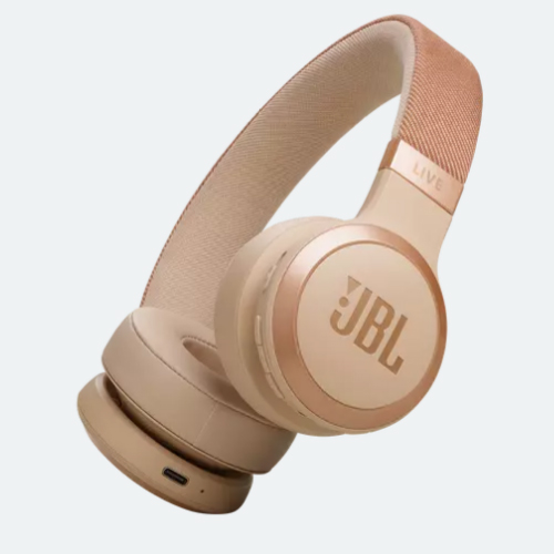 Beige JBL over-ear wireless headphones with a fabric headband.