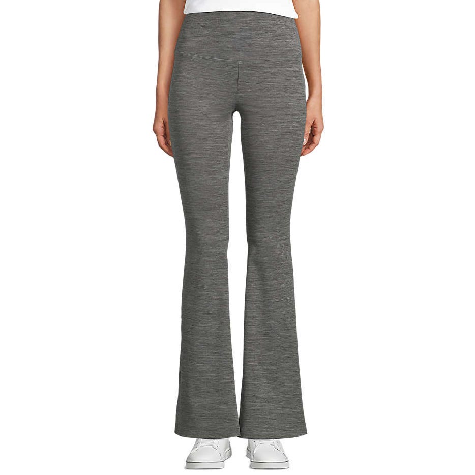 Gray, high-waisted, flared pants paired with white sneakers, suitable for casual or athletic wear.