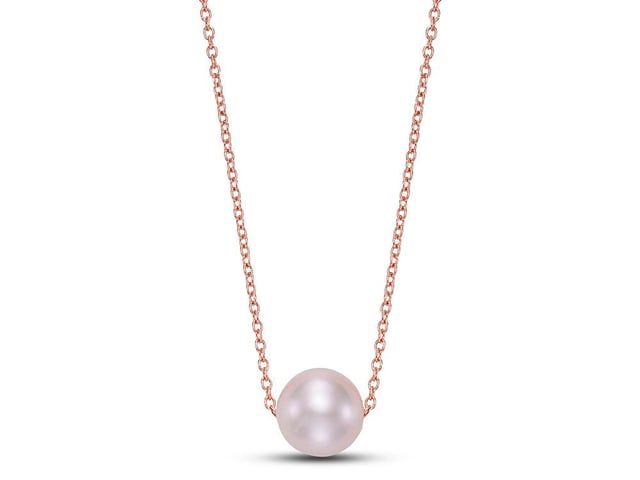 A delicate rose gold chain necklace with a single pearl pendant.
